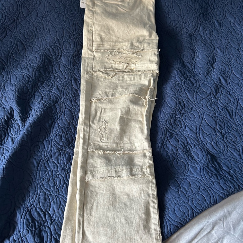 Distressed Cream Jeans